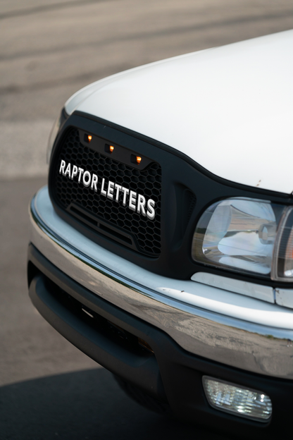 Taco Vinyl Tacoma Raptor Grille | '01 - '04 Tacoma