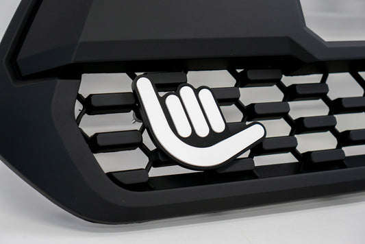 Shaka Grille Badge